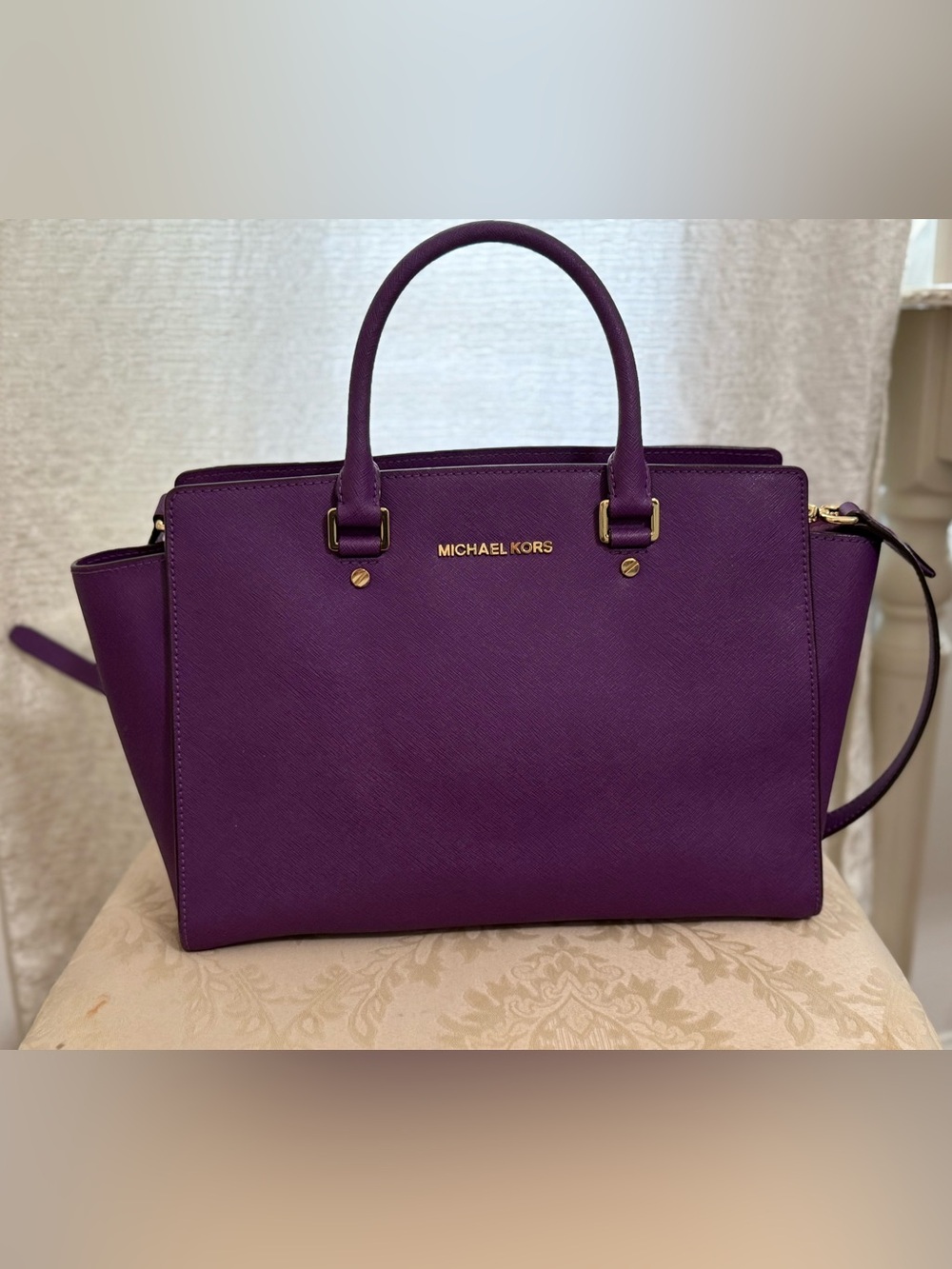 Michael Kors Purple handbag with Gold Hardware